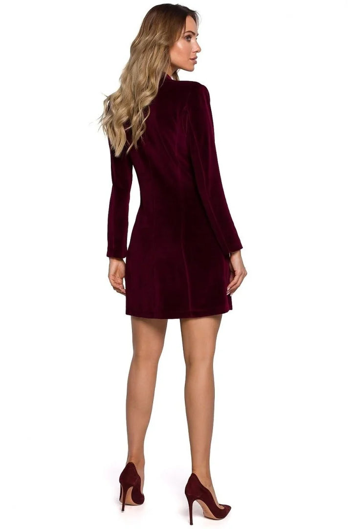 Burgundy velvet mini dress with long sleeves and pointed-toe heels shown from the back.