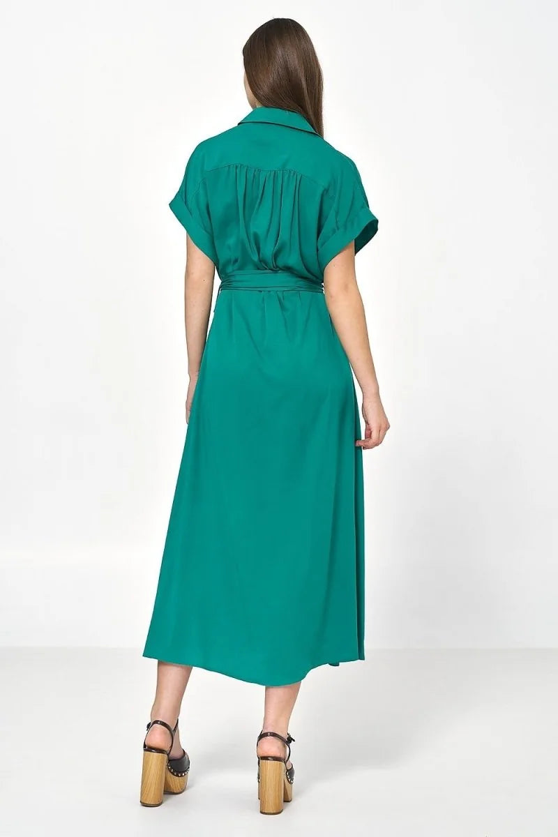 Emerald green midi shirt dress with short sleeves, cinched waist, and wooden platform heels.