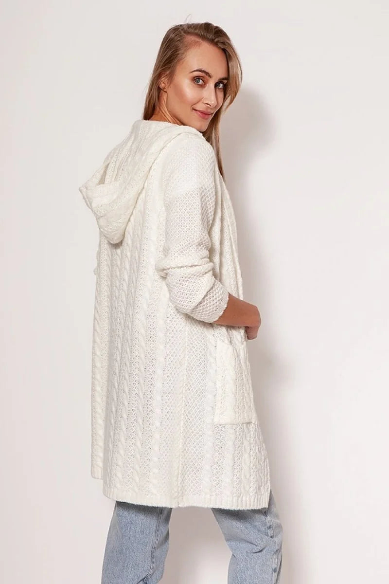 Cream cable knit hooded cardigan with pockets, on model.