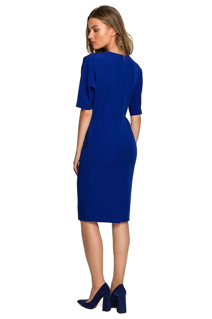 Royal blue midi dress with short sleeves and matching high-heeled shoes, shown from the back.