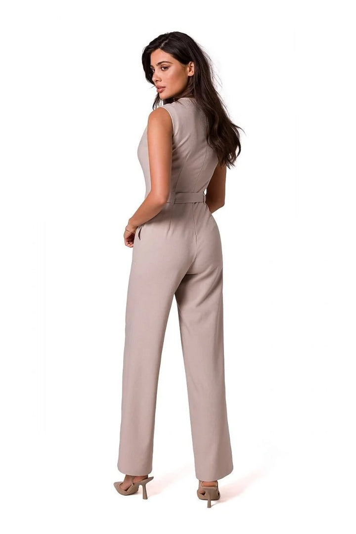 Taupe sleeveless jumpsuit with a belted waist and wide-leg pants, worn by a model.