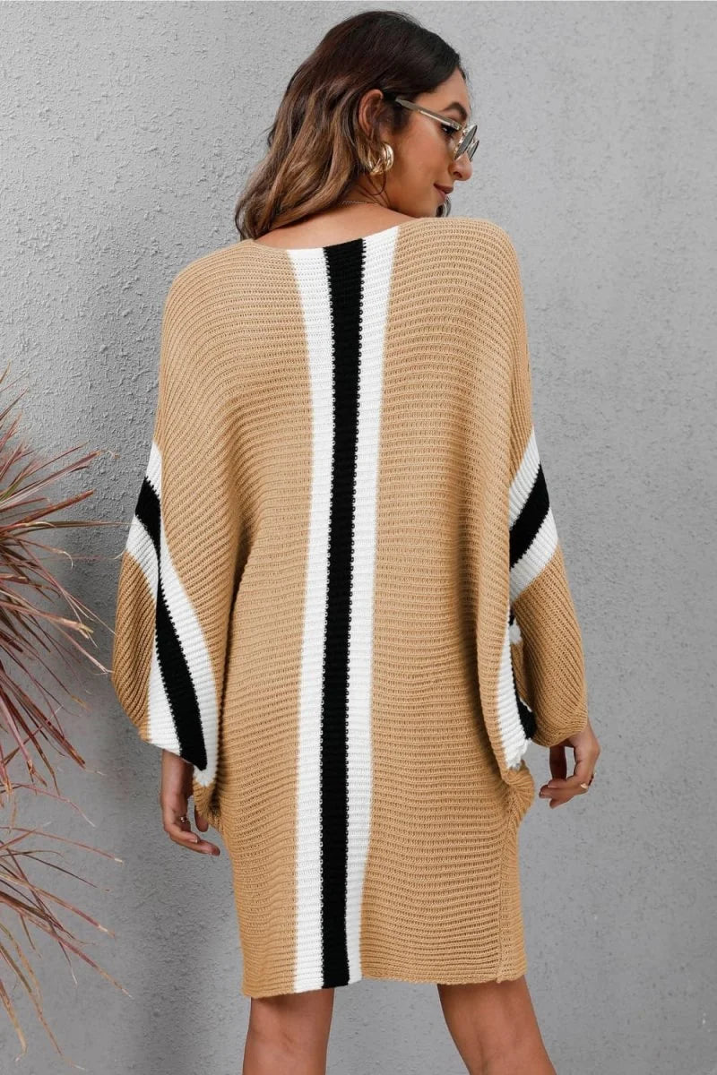 Camel knit sweater dress with vertical black and white stripes on sleeves and back, regular fit.