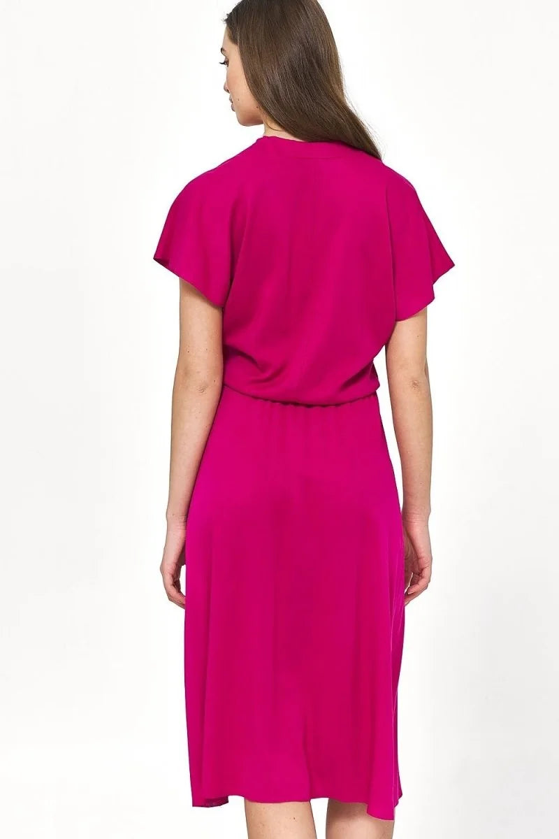 Back view of a bright pink, knee-length dress with short flutter sleeves and an elasticized waist.