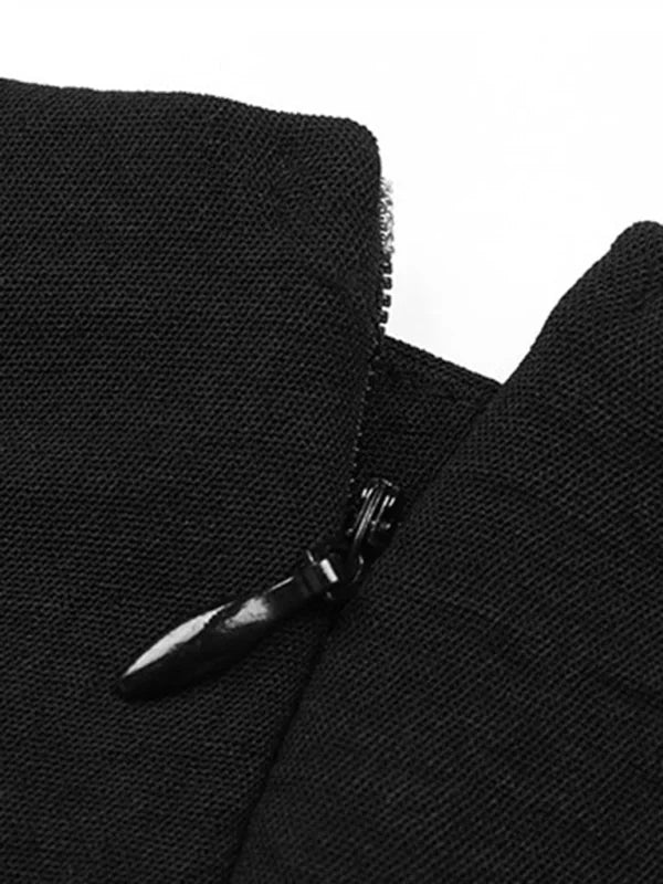 Close-up of a black zipper on textured black fabric.