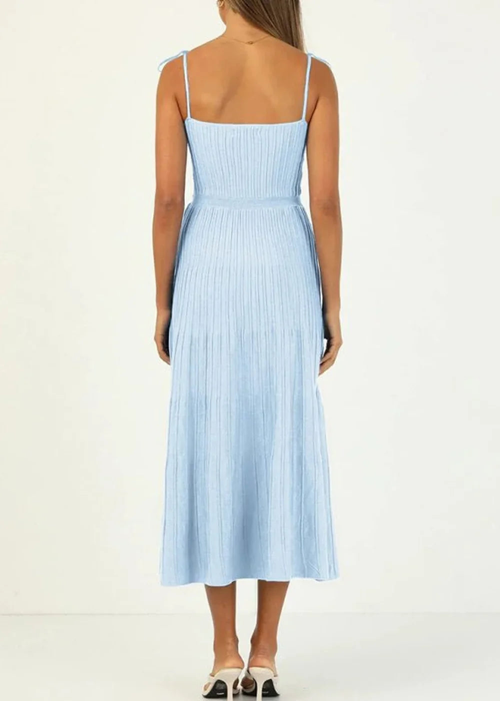 Light blue ribbed knit midi dress with tie straps and a belted waist, shown from the back.
