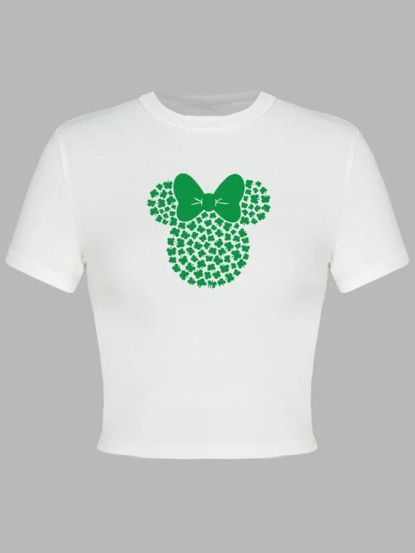 White cropped t-shirt with a green Mickey Mouse-shaped shamrock print.