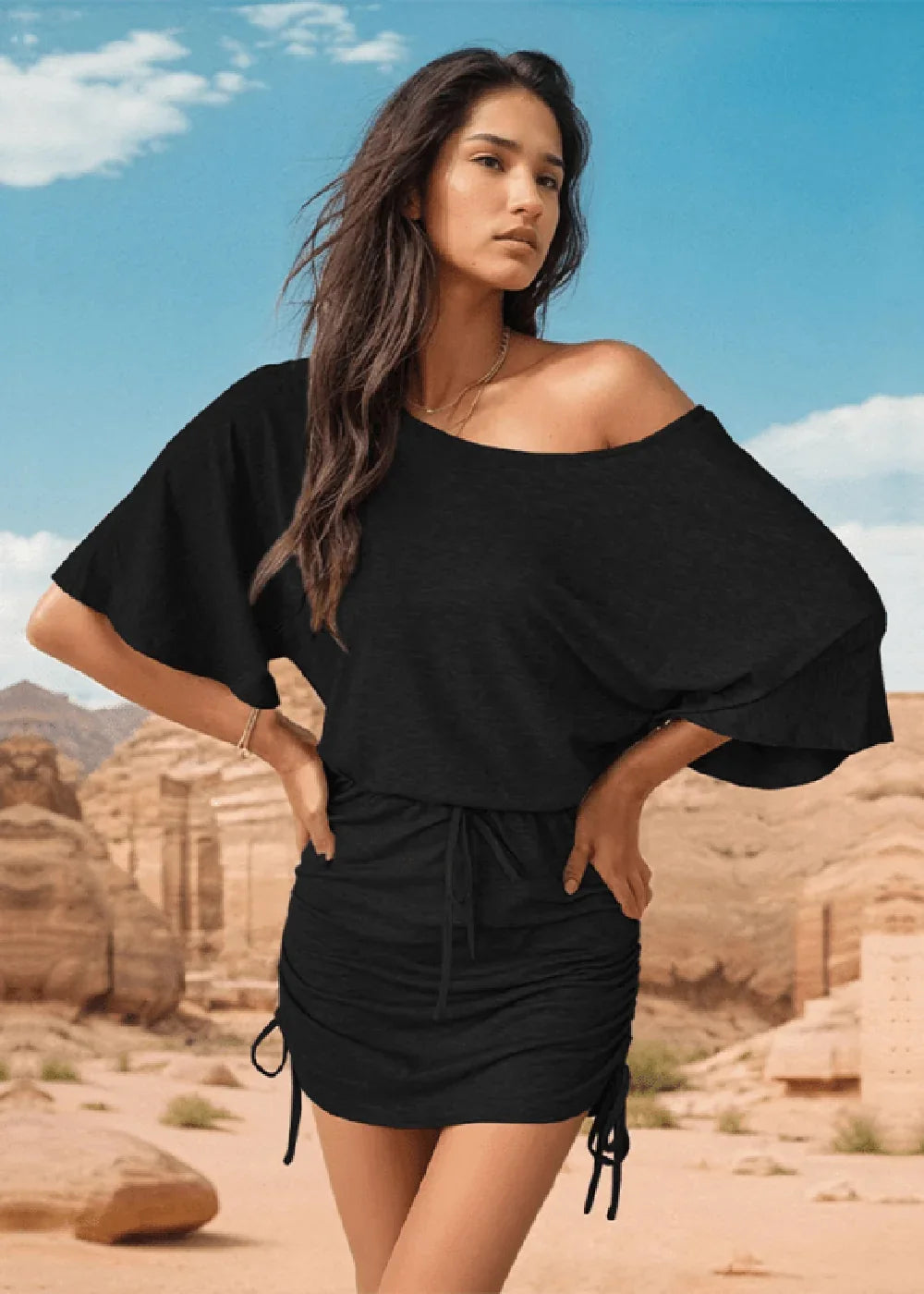 Black off-the-shoulder dress with drawstring ruched skirt and wide sleeves.