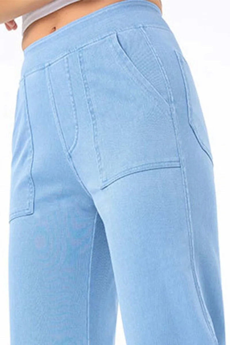 Light blue wide-leg pants with pockets and elastic waistband