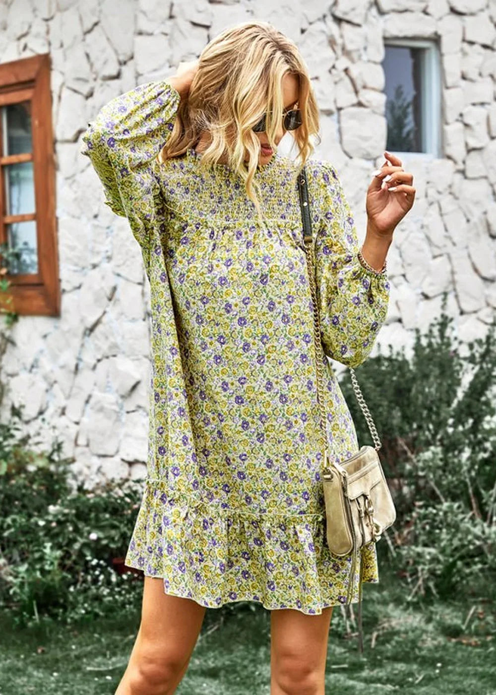 Light yellow floral print day dress with smocked bodice and ruffled hem.