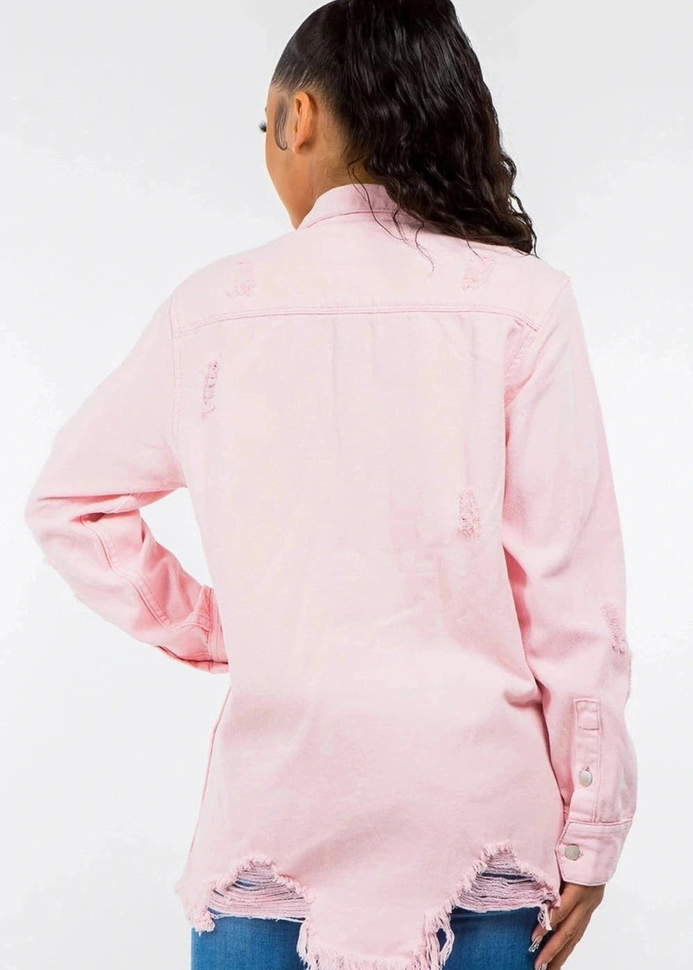 Distressed denim jacket with raw hem