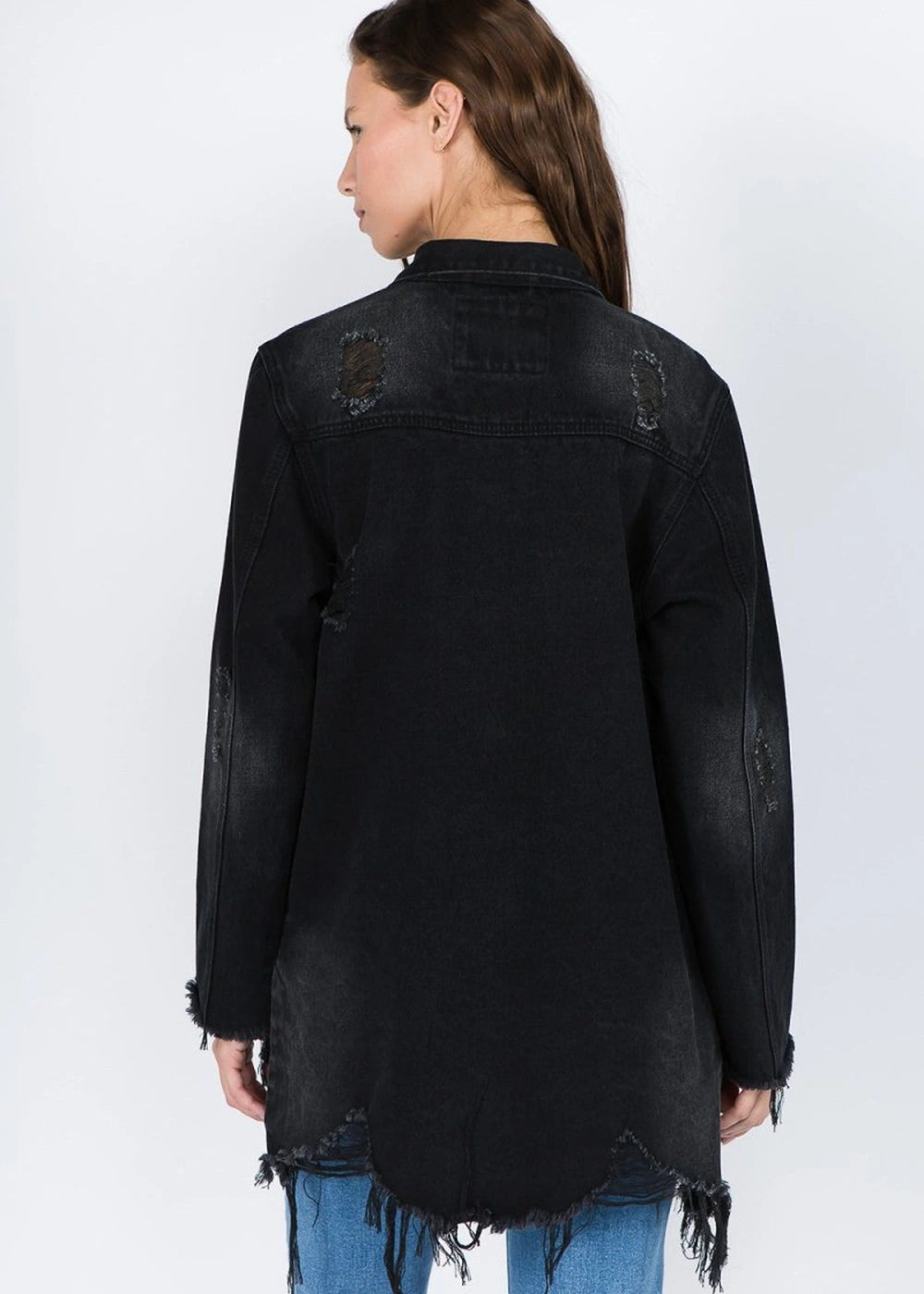 Distressed denim jacket with frayed hem