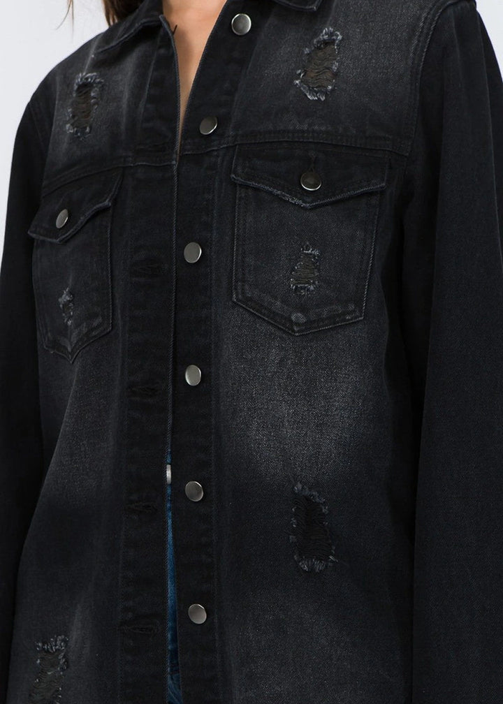 Distressed denim jacket with frayed hem