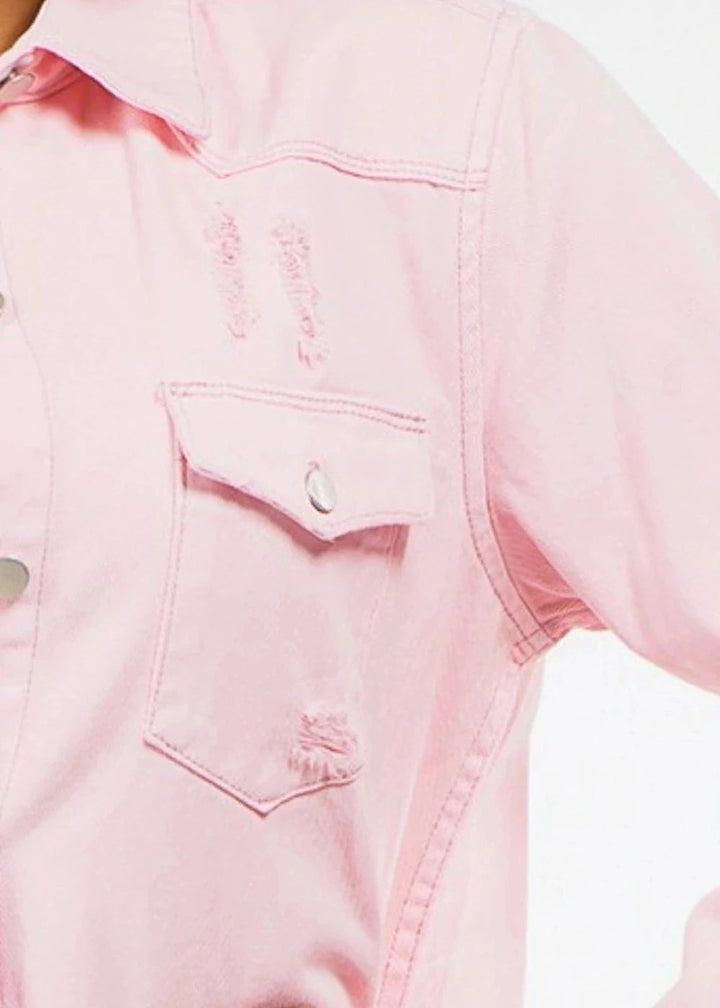 Distressed denim jacket with raw hem